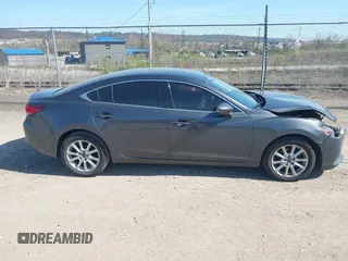 2016 Mazda 6 i Sport with VIN JM1GJ1U54G1413244, listed as a IAAI auction lot 42062416 with 148,970 mi miles and . Bid and sale history available at DreamBid. Image 13.