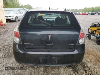 2009 Pontiac Vibe 1SB z VIN 5Y2SP67039Z444883, wystawiony jako Copart lot #51469385 z przebiegiem 146 803 mil mil oraz Szkody całkowita. Historia ofert i sprzedaży dostępna na DreamBid. Obrazek 6.