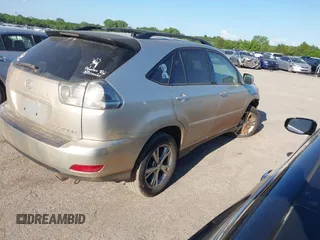 2006 Lexus RX 400h with VIN JTJGW31U860003878, listed as a IAAI auction lot 42226980 with 197,783 mi miles and . Bid and sale history available at DreamBid. Image 4.