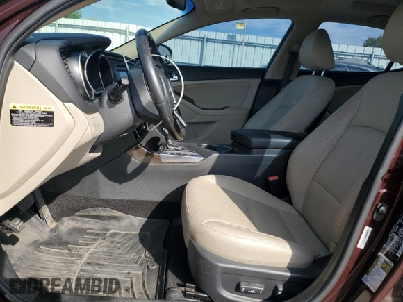 2015 Kia Optima EX with VIN 5XXGN4A79FG409057, listed as a Copart auction lot 62094465 with 123,346 mi miles and Salvage title. Bid and sale history available at DreamBid. Image 7.