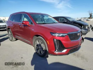 2021 Cadillac XT6 Premium Luxury with VIN 1GYKPDRS8MZ137909, listed as a Copart auction lot 41027774 with 55,353 mi miles and Salvage Title. Bid and sale history available at carsss.com. Image 4.