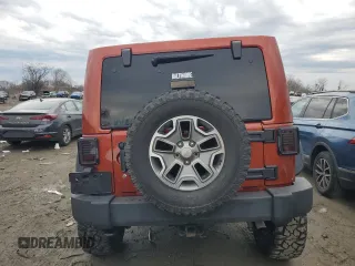 2014 Jeep Wrangler Unlimited Rubicon with VIN 1C4BJWFG0EL187243, listed as a Copart auction lot 45865005 with 53,064 mi miles and Salvage title. Bid and sale history available at DreamBid. Image 6.