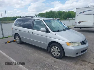 2003 Honda Odyssey EX-L z VIN 5FNRL180X3B023283, wystawiony jako IAAI lot #42166878 z przebiegiem 370 249 mil mil oraz . Historia ofert i sprzedaży dostępna na DreamBid. Obrazek 1.