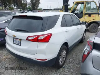 2019 Chevrolet Equinox LS with VIN 2GNAXHEV8K6108399, listed as a IAAI auction lot 42084167 with 72,385 mi miles and . Bid and sale history available at carsss.com. Image 4.