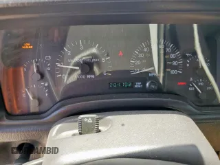 1999 Jeep Cherokee Sport с VIN 1J4FT68S5XL675839, выставлен на аукционе Copart как лот 65230005 с пробегом 204 102 миль миль и Списание • Salvage title. История ставок и продаж доступна на DreamBid. Изображение 9.