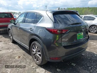 2019 Mazda CX-5 Grand Touring with VIN JM3KFBDM7K0619379, listed as a IAAI auction lot 42007107 with 209,590 mi miles. Bid and sale history available at carsss.com. Image 3.