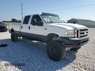 2000 Ford Super Duty F-250 XL with VIN 1FTNW21SXYEA52699, listed as a Copart auction lot 78659054 with 154,056 mi miles and Salvage Title. Bid and sale history available at carsss.com. Image 4.