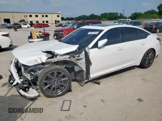 2024 Cadillac CT5 Sport с VIN 1G6DP5RK8R0128601, выставлен на аукционе Copart как лот 59375285 с пробегом 18 036 миль миль и Списание • Salvage title. История ставок и продаж доступна на DreamBid. Изображение 1.