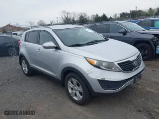 2013 Kia Sportage LX with VIN KNDPBCA22D7498533, listed as a IAAI auction lot 41942756 with 157,618 mi miles. Bid and sale history available at carsss.com. Image 1.
