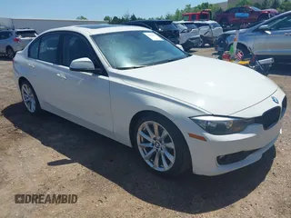 2015 BMW 3 Series 320i xDrive z VIN WBA3C3G50FNT51569, wystawiony jako IAAI lot #42054171 z przebiegiem 74 305 mil mil oraz . Historia ofert i sprzedaży dostępna na DreamBid. Obrazek 1.