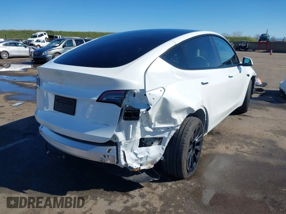 2023 Tesla Model Y Long Range with VIN 7SAYGDEE0PF945202, listed as a IAAI auction lot 41611762 with 7,316 mi miles and . Bid and sale history available at DreamBid. Image 6.