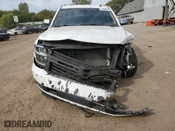 2015 Chevrolet Tahoe LTZ with VIN 1GNSKCKC1FR310018, listed as a Copart auction lot 71798454 with 244,179 mi miles and Salvage title. Bid and sale history available at DreamBid. Image 5.