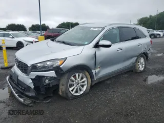 2019 Kia Sorento LX z VIN 5XYPGDA38KG434822, wystawiony jako Copart lot #59807105 z przebiegiem 84 267 mil mil oraz Czysty tytuł • Clean title. Historia ofert i sprzedaży dostępna na DreamBid. Obrazek 1.