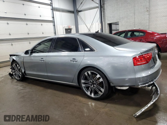 2012 Audi A8 z VIN WAURVAFD3CN025035, wystawiony jako Copart lot #52252915 z przebiegiem 71 312 mil mil oraz Szkoda całkowita • Salvage title. Historia ofert i sprzedaży dostępna na DreamBid. Obrazek 2.
