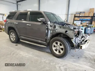 2013 Toyota 4Runner SR5 with VIN JTEZU5JR2D5054927, listed as a Copart auction lot 60018695 with 178,684 mi miles and Clean title. Bid and sale history available at DreamBid. Image 4.