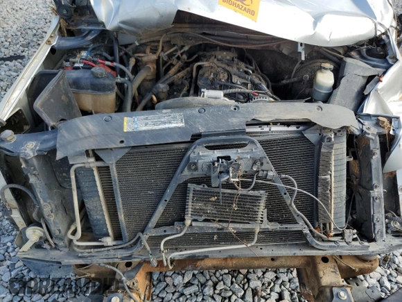 2010 Chevrolet Tahoe LT z VIN 1GNUCBE05AR189634, wystawiony jako Copart lot #56297945 z przebiegiem 292 816 mil mil oraz Szkoda całkowita • Salvage title. Historia ofert i sprzedaży dostępna na DreamBid. Obrazek 12.