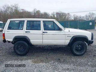 1996 Jeep Cherokee SE with VIN 1J4FJ28S3TL241251, listed as a IAAI auction lot 42073050 with 156,523 mi miles and . Bid and sale history available at DreamBid. Image 13.