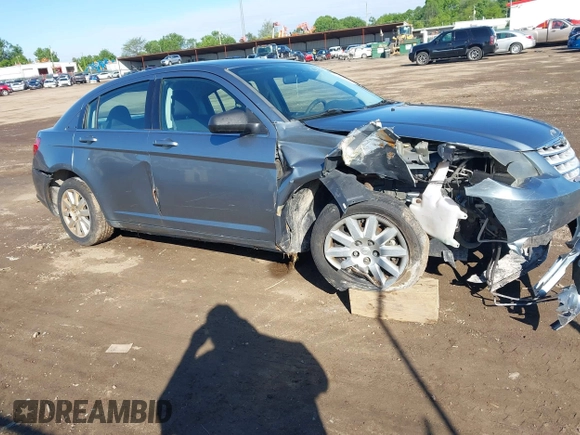 2010 Chrysler Sebring Touring z VIN 1C3CC4FB0AN128655, wystawiony jako IAAI lot #42311837 z przebiegiem 205 720 mil mil oraz . Historia ofert i sprzedaży dostępna na DreamBid. Obrazek 6.