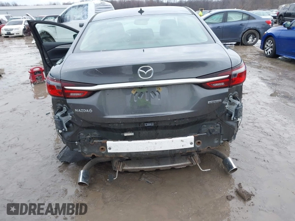 2020 Mazda 6 Grand Touring with VIN JM1GL1TYXL1524543, listed as a IAAI auction lot 41474337 with 52,160 mi miles and . Bid and sale history available at DreamBid. Image 6.