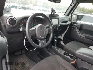 2015 Jeep Wrangler Sport with VIN 1C4AJWAG1FL525429, listed as a Copart auction lot 43033025 with 93,972 mi miles and Salvage title. Bid and sale history available at DreamBid. Image 8.