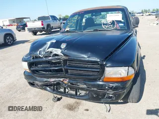 2000 Dodge Dakota SLT with VIN 1B7GL26ZXYS720333, listed as a IAAI auction lot 41972966 with 111,584 mi miles and . Bid and sale history available at carsss.com. Image 6.