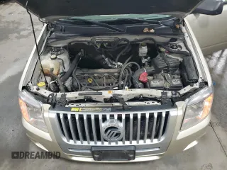 2010 Mercury Mariner z VIN 4M2CN9B73AKJ23952, wystawiony jako Copart lot #56874615 z przebiegiem 162 214 mil mil oraz Szkoda całkowita • Salvage title. Historia ofert i sprzedaży dostępna na DreamBid. Obrazek 12.
