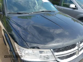 2014 Dodge Journey SE with VIN 3C4PDCABXET235827, listed as a IAAI auction lot 41927966 with 186,179 mi miles and . Bid and sale history available at carsss.com. Image 14.