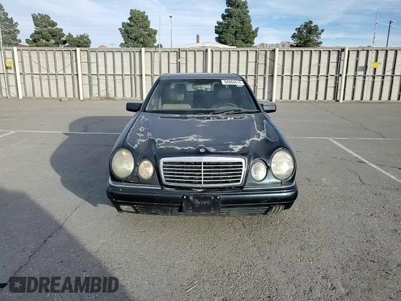 1997 Mercedes-Benz E-Class with VIN WDBJF72F8VA204316, listed as a Copart auction lot 84684614 with 203,748 mi miles and Salvage Title. Bid and sale history available at carsss.com. Image 11.