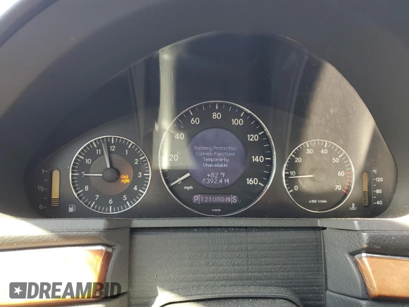 2003 Mercedes-Benz E-Class 3.2L with VIN WDBUF65J03A281430, listed as a Copart auction lot 77086054 with 121,080 mi miles and Salvage Title. Bid and sale history available at carsss.com. Image 9.