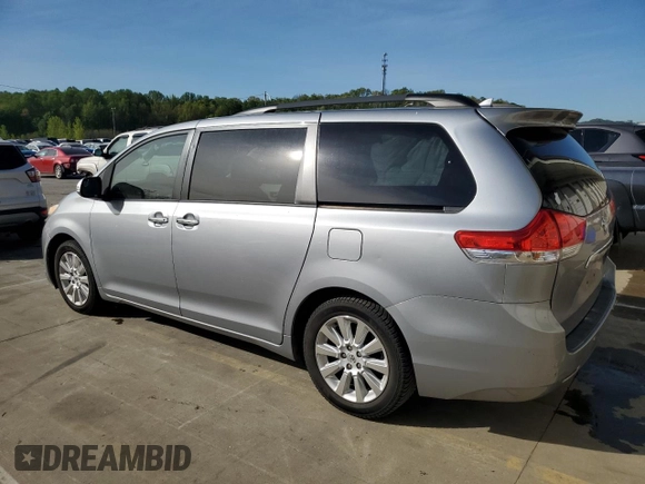 2013 Toyota Sienna XLE AAS with VIN 5TDYK3DC1DS318277, listed as a Copart auction lot 54156935 with 218,564 mi miles and Salvage title. Bid and sale history available at DreamBid. Image 2.