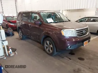 2015 Honda Pilot EX-L with VIN 5FNYF4H52FB043354, listed as a IAAI auction lot 41458416 with 137,137 mi miles and . Bid and sale history available at carsss.com. Image 1.
