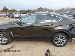 2015 BMW X6 xDrive35i z VIN 5UXKU2C56F0N76862, wystawiony jako IAAI lot #41747776 z przebiegiem 119 426 mil mil oraz . Historia ofert i sprzedaży dostępna na DreamBid. Obrazek 15.