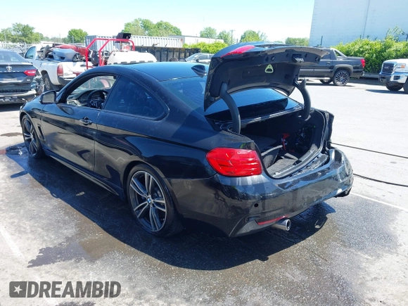2015 BMW 4 Series 435i with VIN WBA3R1C56FK194060, listed as a IAAI auction lot 42061619 with 153,384 mi miles and . Bid and sale history available at DreamBid. Image 3.