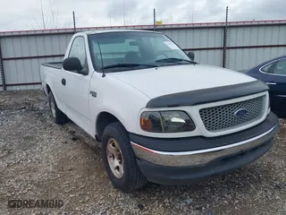 1999 Ford F-150 Work Series with VIN 1FTZF1729XKA57119, listed as a IAAI auction lot 41884745 with 1 mi miles. Bid and sale history available at carsss.com. Image 1.