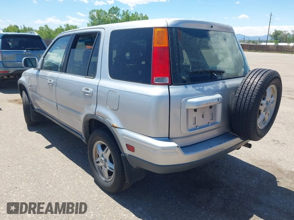 2001 Honda CR-V SE z VIN JHLRD18761C008237, wystawiony jako IAAI lot #42322175 z przebiegiem 289 568 mil mil oraz . Historia ofert i sprzedaży dostępna na DreamBid. Obrazek 3.
