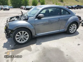 2017 Volkswagen Beetle SE with VIN 3VWJ17AT3HM607874, listed as a Copart auction lot 62845475 with 96,759 mi miles and Salvage title. Bid and sale history available at DreamBid. Image 1.