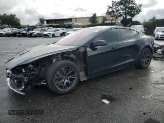 2024 Tesla Model S with VIN 5YJSA1E54RF536092, listed as a Copart auction lot 85934334 with 11,451 mi miles and Salvage title. Bid and sale history available at DreamBid. Image 1.