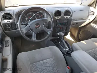 2005 GMC Envoy SLE with VIN 1GKDT13S752390266, listed as a Copart auction lot 50766935 with 115,225 mi miles and Salvage Title. Bid and sale history available at carsss.com. Image 8.