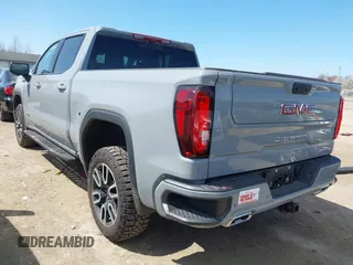 2024 GMC Sierra 1500 AT4 with VIN 1GTUUEE81RZ291215, listed as a IAAI auction lot 42029622 with 25,131 mi miles and . Bid and sale history available at DreamBid. Image 3.
