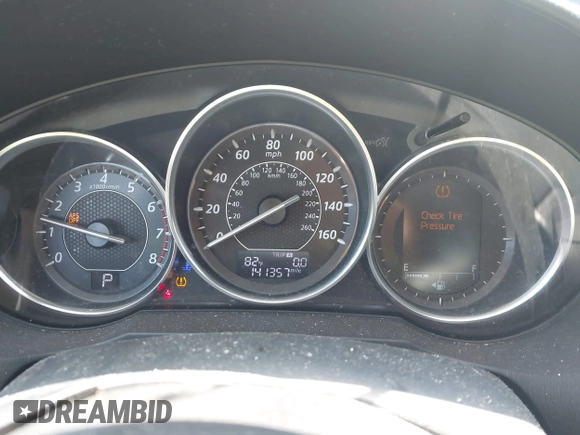 2015 Mazda 6 i Grand Touring with VIN JM1GJ1W50F1204322, listed as a IAAI auction lot 40694216 with 141,357 mi miles. Bid and sale history available at carsss.com. Image 7.