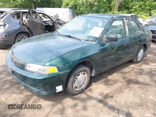 1998 Mitsubishi Mirage DE z VIN JA3AY26A2WU001675, wystawiony jako IAAI lot #42484995 z przebiegiem 89 680 mil mil oraz . Historia ofert i sprzedaży dostępna na DreamBid. Obrazek 2.