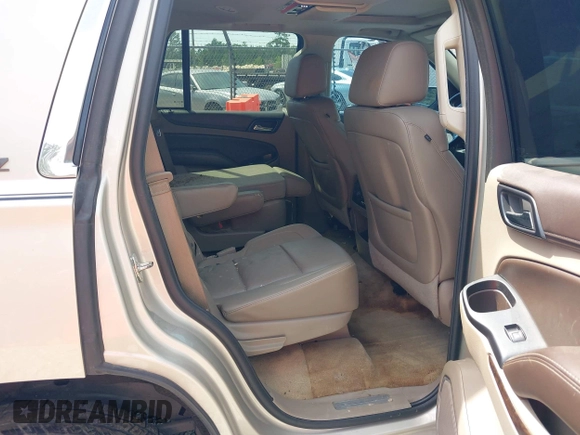 2015 Chevrolet Tahoe LT z VIN 1GNSCBKC7FR140125, wystawiony jako IAAI lot #42279760 z przebiegiem 201 335 mil mil oraz . Historia ofert i sprzedaży dostępna na DreamBid. Obrazek 8.