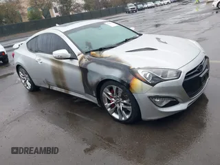 2013 Hyundai Genesis Coupe Grand Touring z VIN KMHHU6KJ0DU106880, wystawiony jako IAAI lot #41529559 z przebiegiem Nie podano mil oraz . Historia ofert i sprzedaży dostępna na DreamBid. Obrazek 1.