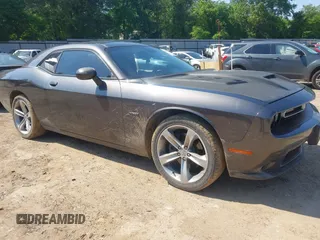 2015 Dodge Challenger R/T with VIN 2C3CDZAT1FH900865, listed as a IAAI auction lot 41973214 with 136,053 mi miles and . Bid and sale history available at DreamBid. Image 1.