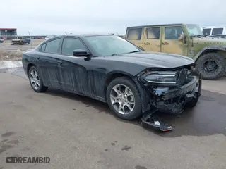 2016 Dodge Charger SXT with VIN 2C3CDXJG9GH303942, listed as a IAAI auction lot 41618893 with 116,630 mi miles. Bid and sale history available at carsss.com. Image 1.
