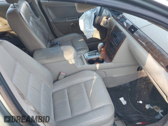 2006 Ford Five Hundred SEL с VIN 1FAHP24166G119142, выставлен на аукционе IAAI как лот 41100131 с пробегом Не указан миль и . История ставок и продаж доступна на DreamBid. Изображение 5.