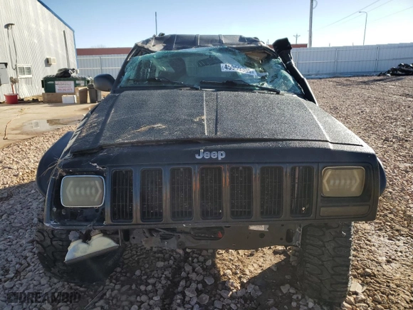 2000 Jeep Cherokee Police with VIN 1J4FF48S8YL103256, listed as a Copart auction lot 45959305 with 0 mi miles and Salvage Title. Bid and sale history available at carsss.com. Image 5.
