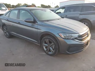 2023 Volkswagen Jetta SE with VIN 3VW7M7BUXPM012396, listed as a IAAI auction lot 42073638 with 24,593 mi miles and . Bid and sale history available at DreamBid. Image 1.