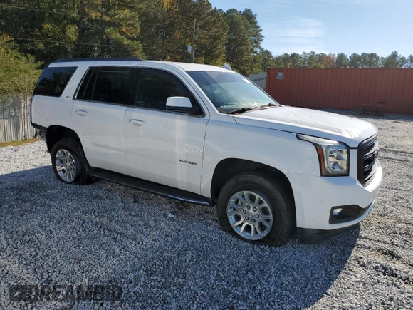 2020 GMC Yukon SLT with VIN 1GKS1BKC2LR248912, listed as a Copart auction lot 79935584 with 100,313 mi miles and Salvage Title. Bid and sale history available at DreamBid. Image 4.