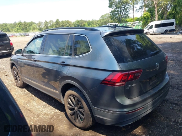 2018 Volkswagen Tiguan SEL with VIN 3VV2B7AXXJM020392, listed as a IAAI auction lot 42646948 with 58,685 mi miles and . Bid and sale history available at DreamBid. Image 14.